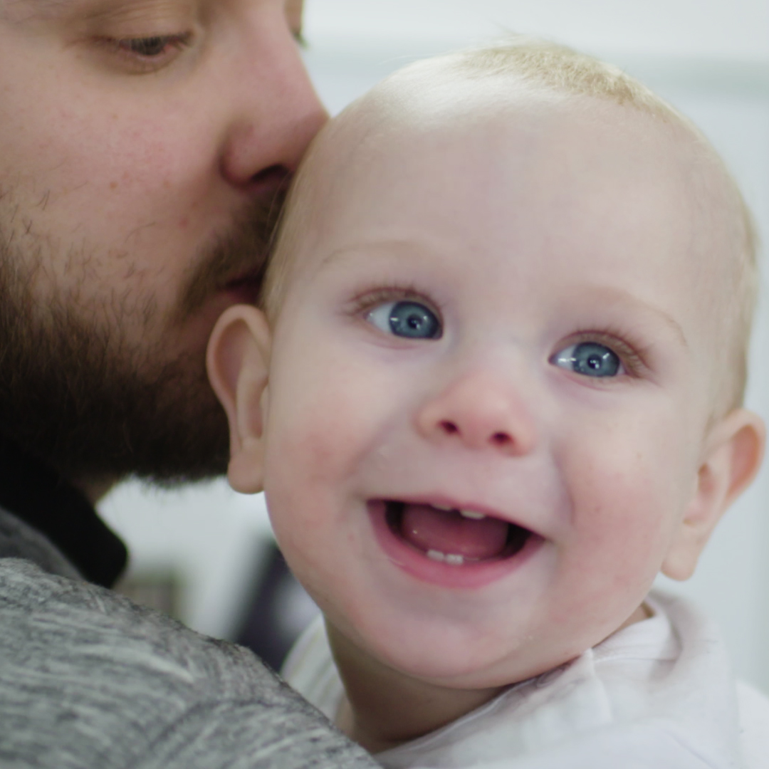 Banner father and smiling baby