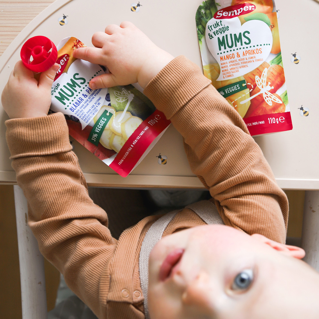 Baby with Semper fruit and veggie mums