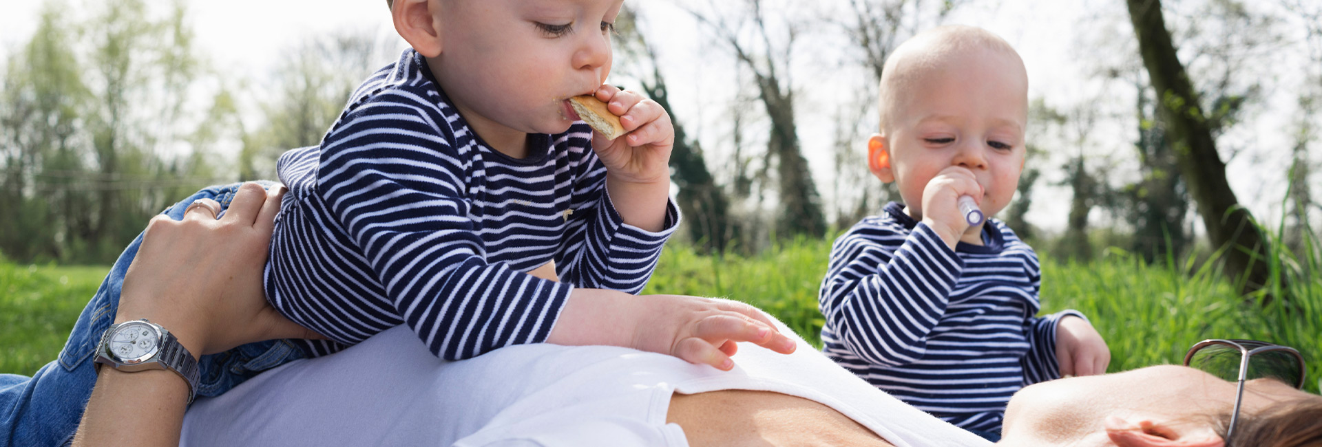Mother with babies outdoors