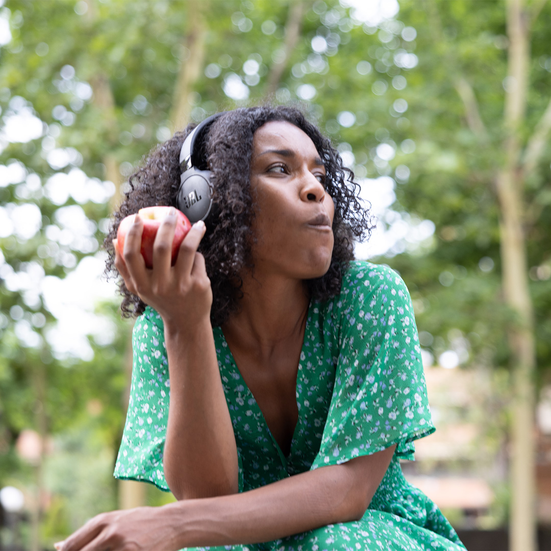 Woman eating apple
